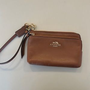 Brown leather Coach Wristlet